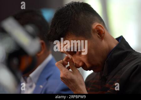 (190614) -- PEKING, 14. Juni 2019 -- Malaysias Badmintonspieler Lee Chong Wei reagiert während einer Pressekonferenz und kündigt seinen Rücktritt in Putrajaya, Malaysia, am 13. Juni 2019 an. ) XINHUA FOTOS DES TAGES ChongxVoonxChung PUBLICATIONxNOTxINxCHN Stockfoto