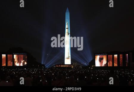 (190721) -- WASHINGTON, 21. Juli 2019 -- ein Bild einer Saturn-V-Rakete, die während der Apollo-11-Mondlandungsmission verwendet wurde, wird auf das Washington Monument in Washington D.C., USA, 20. Juli 2019 projiziert. Die Projektionsshow soll den 50. Jahrestag der Apollo 11-Mondlandung feiern. ) U.S.-WASHINGTON D.C.-APOLLO 11-50 JAHRE LIUXJIE PUBLICATIONXNOTXINXCHN Stockfoto