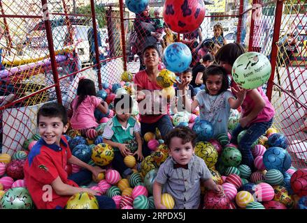 (190814) -- DAMASKUS, 14. August 2019 -- Kinder genießen ihre Zeit während des viertägigen Urlaubs des Eid al-Adha in Damaskus, Syrien, 13. August 2019. (Foto: /Xinhua) SYRIA-DAMASCUS-EID AL-ADHA-HOLIDAY AmmarxSafarjalani PUBLICATIONxNOTxINxCHN Stockfoto