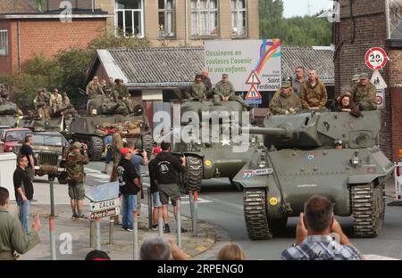 News Bilder des Tages (190901) -- MONS (BELGIEN), 1. September 2019 -- Panzerparade anlässlich des 75. Jahrestages der Befreiung Brüssels in Mons, Belgien, am 1. September 2019. Die alliierten Truppen befreiten Brüssel 1944 während des Zweiten Weltkriegs von der deutschen Besatzung. BELGIEN-MONS-WWII-BEFREIUNGSJUBILÄUM WangxXiaojun PUBLICATIONxNOTxINxCHN Stockfoto