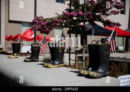 (190912) -- SAN FRANCISCO, 12. September 2019 -- Shoe Memorials sind organisiert, um die Opfer der Terroranschläge von 9/11 in Livermore, Kalifornien, USA, zu betrauern, 11. September 2019. (Foto: /Xinhua) U.S.-9/11-18. GEBURTSTAG LixJianguo PUBLICATIONxNOTxINxCHN Stockfoto