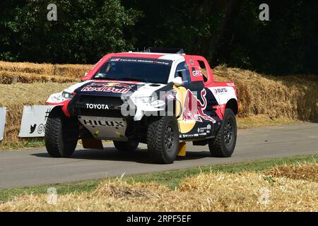 Mathiew Baumel, Toyota GR DKR Hilux T1+, Eine Auswahl der weltweit besten und erfolgreichsten Rallyefahrzeuge, die Bühnenrallyes, Rallyefälle und End umfassen Stockfoto