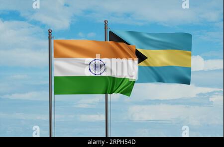 Die Flagge Bahamas und Indiens weht im Wind am blauen Himmel zusammen, zwei Länder-Kooperationskonzept Stockfoto