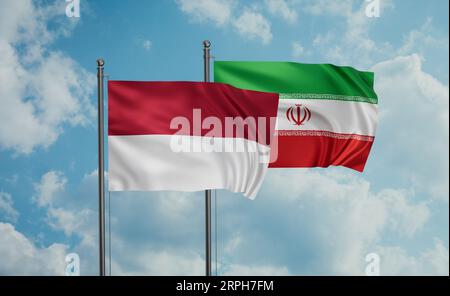 Die Flagge Irans und die Flagge Indonesiens und Balis wehen am blauen Himmel zusammen Stockfoto
