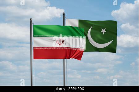 Pakistanische Flagge und iranische Flagge, die am blauen Himmel zusammenwinken, zwei-Länder-Kooperationskonzept Stockfoto