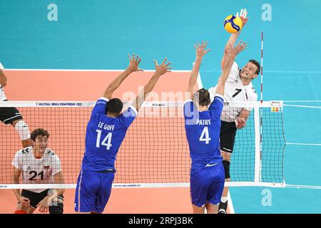 Christian Fromm (Deutschland), Nicolas Le Goff, Jean Patry (Frankreich). Volleyball-Weltmeisterschaft 2022. Stockfoto