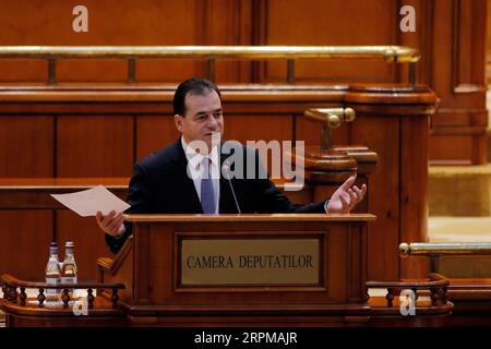 News Bilder des Tages 200206 -- BUKAREST, 6. Februar 2020 Xinhua -- der PNL-Führer der rumänischen Nationalen Liberalen Partei Ludovic Orban spricht vor dem parlament in Bukarest, der Hauptstadt Rumäniens, am 5. Februar 2020. Die rumänische Regierung verlor am Mittwoch einen Mißtrauensantrag, der von den wichtigsten oppositionellen Sozialdemokraten initiiert wurde, nur drei Monate nach ihrem Amtsantritt am 4. November. Das Kabinett unter der Führung von Ludovic Orban, dem Führer der PNL der National Liberal Party, wurde die fünfte Regierung, die in den letzten 30 Jahren in einem Mißtrauensantrag in Rumänien zurücktrat. Foto von Cristian Cristel/Xinhua RUMÄNIEN-BUKAREST-REGIERUNG-MISSTRAUENSANTRAG ÖFFENTLICHKEIT Stockfoto