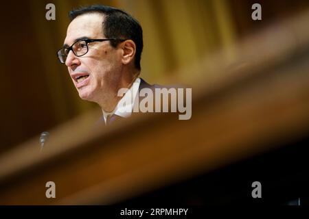 200212 -- WASHINGTON, 12. Februar 2020 -- der US-Finanzminister Steven Mnuchin bezeugt vor dem Finanzausschuss des Senats während einer Anhörung zum Haushaltsplan des Präsidenten für das Geschäftsjahr 2021 auf dem Capitol Hill in Washington D.C., USA, am 12. Februar 2020. Foto von /Xinhua U.S.-WASHINGTON D.C.-STEVEN MNUCHIN-GESCHÄFTSJAHR 2021-BUDGET-ANHÖRUNG TingxShen PUBLICATIONxNOTxINxCHN Stockfoto