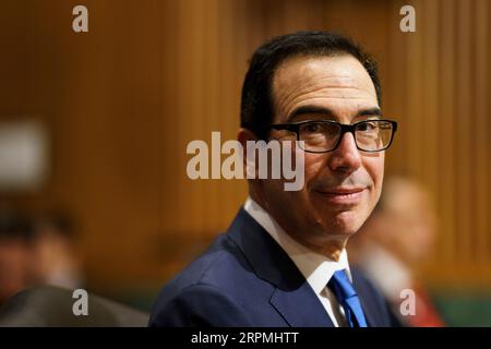 200212 -- WASHINGTON, 12. Februar 2020 -- der US-Finanzminister Steven Mnuchin bezeugt vor dem Finanzausschuss des Senats während einer Anhörung zum Haushaltsplan des Präsidenten für das Geschäftsjahr 2021 auf dem Capitol Hill in Washington D.C., USA, am 12. Februar 2020. Foto von /Xinhua U.S.-WASHINGTON D.C.-STEVEN MNUCHIN-GESCHÄFTSJAHR 2021-BUDGET-ANHÖRUNG TingxShen PUBLICATIONxNOTxINxCHN Stockfoto