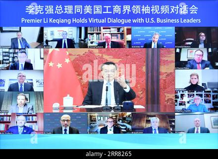 210413 -- PEKING, 13. April 2021 -- der chinesische Premier Li Keqiang führt virtuellen Dialog mit US-Geschäftsführern in Peking, Hauptstadt Chinas, 13. April 2021. CHINA-PEKING-LI KEQIANG-USA BUSINESS LEADERS-VIRTUAL DIALOG CN YanxYan PUBLICATIONxNOTxINxCHN Stockfoto