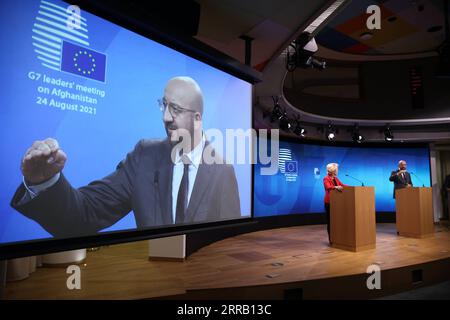 210824 -- BRÜSSEL, 24. August 2021 -- die Präsidentin der Europäischen Kommission, Ursula von der Leyen L, und der Präsident des Europäischen Rates, Charles Michel, nehmen an einer Pressekonferenz nach dem virtuellen Treffen der Gruppe der sieben G7-Staats- und Regierungschefs zu Afghanistan am 24. August 2021 in Brüssel, Belgien, Teil. Die Präsidentin der Europäischen Kommission, Ursula von der Leyen, erklärte am Dienstag, dass die Staats- und Regierungschefs der G7 sich einig seien, dass es ihre kollektive moralische Pflicht sei, den afghanischen Menschen in der gegenwärtigen Lage in Afghanistan zu helfen. BELGIEN-BRÜSSEL-EU-G7-STAATS- UND REGIERUNGSCHEFS TREFFEN-AFGHANISTAN-PRESSEKONFERENZ ZHENGXHUANSONG PUBLICATIONXNOTXINXCHN Stockfoto