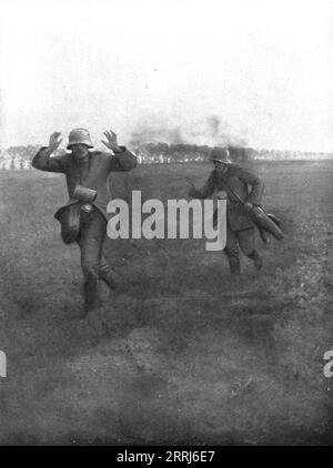 "Notre Artillerie d'Assaut; La Replique de Foch: Au Sud-ouest de Soissons; "Kamarad !": ces deux capitifs dociles pris par un char d'assaut, du cote de Vierzy, au Sud de Soissons, le 18. Juli 1918, ont ete photographies de l'interieur meme du char", 1918. Aus L’Album de la Guerre 1914-1919, Band 2 [L’Illustration, Paris, 1924]. Stockfoto