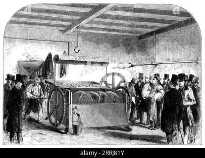 Experimente mit Stevens Brotbackmaschine im Marylebone Workhouse, 1858. „Herr Stevens, der Erfinder der Brotbackmaschine A B C, ist ein praktischer Bäcker und hat sich einen großen Ruf für die hervorragenden Qualitäten seines „Familienbrotes“ erworben. Es wird ganz von seinen eigenen Maschinen hergestellt, und seine Leichtigkeit und Reinheit sind zweifellos auf die verbesserten Mittel zurückzuführen, die bei der Herstellung verwendet werden... die Ergebnisse des Experiments zeigen den vollständigsten Erfolg... zwei Säcke Mehl wurden in der üblichen Weise von Hand hergestellt, und die gleiche Menge, die im Jahr machine...it hergestellt wurde, wurde festgestellt, dass t Stockfoto