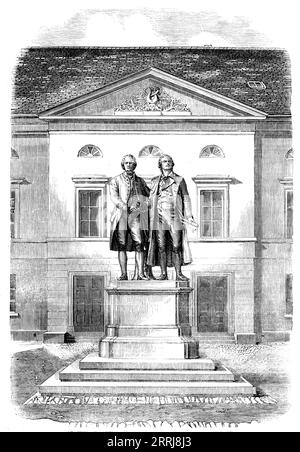 Statuen von Goethe und Schiller in Weimar, 1858. Skulptur deutscher Schriftsteller und Dramatiker Johann Wolfgang von Goethe und Friedrich Schiller. Rietschel, der Dresdner Bildhauer, der für die Ausführung dieser Statuen ausgewählt wurde, hat sie angemessen dargestellt, indem er die gleiche Lorbeerkrone ergriff. Dieses Werk trug wesentlich zum Ruhm des Künstlers bei und brachte ihm das Kreuz eines Kommandeurs des Falkenordens ein. Aus Illustrated London News, 1858. Stockfoto