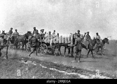 „Les Fuyards; Officiers russes et anglais des automobiles blindees arretant un convoi de soldats qui fuyaient le Front sur des chars enlev&#xe9;s a l'Intendance“, 1917. Runaways: Russische und englische Offiziere aus gepanzerten Fahrzeugen halten einen Konvoi von Soldaten an, die auf gestohlenen Wagen von der Front flohen. Aus L’Album de la Guerre 1914-1919, Band 2 [L’Illustration, Paris, 1924]. Stockfoto