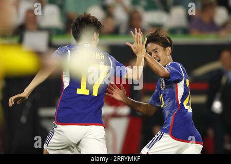 WOLFSBURG - (l-r) Ao Tanake aus Japan, Shuto Machino aus Japan feiern die 1-4 während des Interland-Freundschaftsspiels zwischen Deutschland und Japan in der Volkswagen Arena am 9. September 2023 in Wolfsburg. ANP | Hollandse Hoogte | BART STOUTJESDIJK Stockfoto