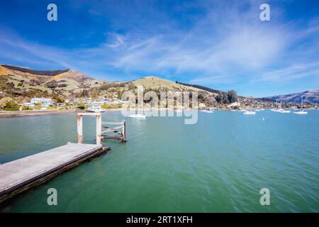 Die wichtigsten Wharf Pier in der französische Siedlung von Akaroa auf Banken Halbinsel in Neuseeland Stockfoto