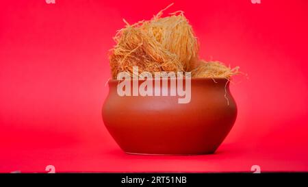 Indian Rajasthani crunchy sweet dish called Ghevar or Ghewar is an made using refined flour, sugar, and ghee. Generally prepared in festive season of Stock Photo