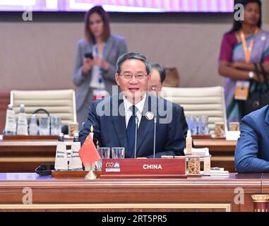 230910 -- NEU DELHI, 10. September 2023 -- der chinesische Premier Li Qiang spricht die dritte Sitzung des 18. G20-Gipfels in Neu Delhi, Indien, 10. September 2023 an. INDIEN-NEU DELHI-CHINA-LI QIANG-G20 GIPFEL-DRITTE SITZUNG YUEXYUEWEI PUBLICATIONXNOTXINXCHN Stockfoto