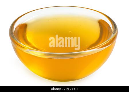Honig in einer Glasschale isoliert auf weiß. Stockfoto