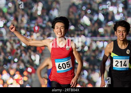 Japanische Athleten laufen auf der Rennstrecke Stockfoto