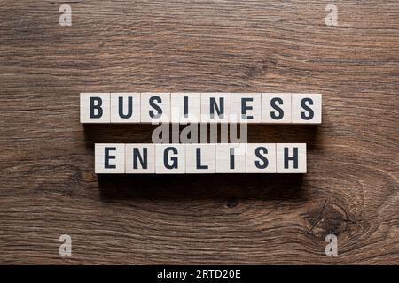 Business English – Wortkonzept auf Bausteinen, Text Stockfoto