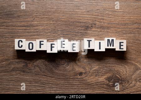 Kaffeezeit - Wortkonzept auf Bausteinen, Text Stockfoto