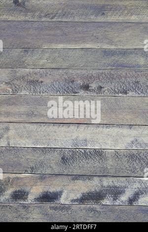 Dunkle alte Holzbretter. Tabelle, Bodenstruktur mit Flecken Hintergrund, Draufsicht. Vertikal, horizontal. Leerzeichen kopieren Stockfoto
