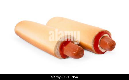 Leckere französische Hot Dogs mit Sauce isoliert auf weiß Stockfoto