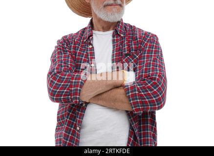 Erntesaison. Farmer mit gekreuzten Armen auf weißem Hintergrund, Nahaufnahme Stockfoto