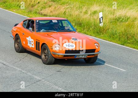 Eine Fahrt für Oldtimer. Gekonntes Handling des Fahrzeugs, Streckenfindung anhand des Fahrtenbuchs und konsistente Fahrweise werden Stockfoto