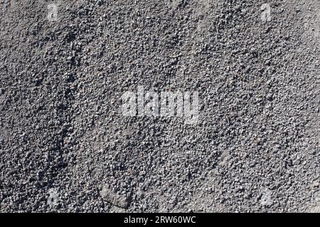 Hintergrund des kleinen Schutts. Flache Steinstruktur. Stockfoto