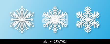 Drei weiße Schneeflocken auf blauem Hintergrund. Stock Vektor