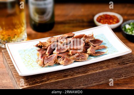 Marinierter Entengizzard in gewürzter Sauce Stockfoto