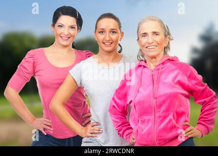 Gruppe von drei fröhlichen Frauen Fitness auf weißem Hintergrund Stockfoto