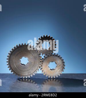 Drei alte Zahnräder Stockfoto