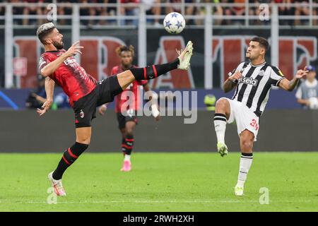 Mailand, Italien. September 2023. Milano, Italien - 18. september 2023 - A.C. Milan vs Newcastle United fc Champions League - giroud a.c. mailand und guimaraes bruno newcastle Credit: Kines Milano/Alamy Live News Stockfoto