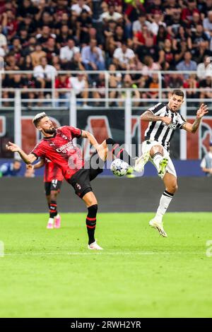 Mailand, Italien. September 2023. Milano, Italien - 18. september 2023 - A.C. Milan vs Newcastle United fc Champions League - giroud a.c. mailand und guimaraes bruno newcastle Credit: Kines Milano/Alamy Live News Stockfoto