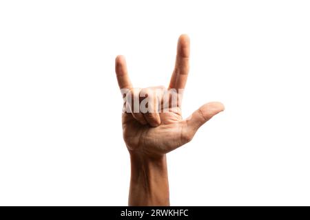 Schwarze männliche Hand, die Steinschild mit Hörnern ohne Hintergrund macht Stockfoto