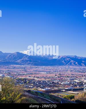 Präfektur Yamanashi Landschaften Pfirsichblüten in der Stadt Yamanashi und Mt. Fuji in der Ferne das unbenannte Observatorium Stockfoto