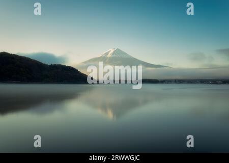 Mt. Fuji in the morning sun and upside-down Mt. Fuji seen from Kawaguchi Lake Stock Photo