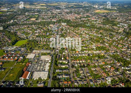 Luftaufnahme, Lageansicht, Wohnen und Wohnen, Rewe Supermarkt und Aldi Supermarkt, Tedox Baumarkt, Cheruskerstraße, Beckum, Münsterland, North Rhi Stockfoto