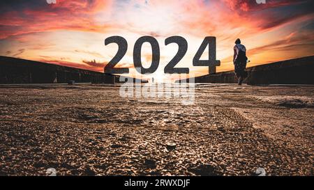 Happy New Year 2024 Concept mit dem Year 2024 Text on Distant. Hochauflösendes Foto für große Displays, Drucken, Banner. Stockfoto