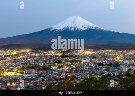 Yamanashi Mt. Fuji and the night view of Fujiyoshida City from Niikurayama Sengen Park Stock Photo
