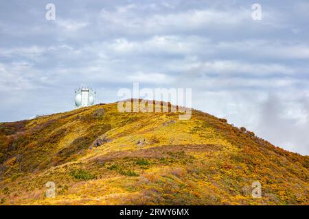 Autumn foliage scenery of the Myoko Mountains seen from the highest point of the Sado Island Sado Skyline and ATC radar of the Air Self-Defense Force Stock Photo