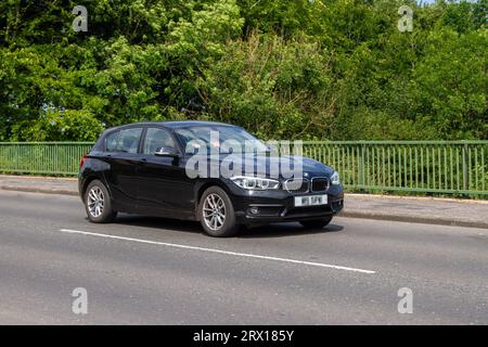 2018 BMW 116D SE Business 116D Start/Stop Black Car Hatchback Diesel 1496 ccm; Fahrt mit Höchstgeschwindigkeit auf der Autobahn M6 im Großraum Manchester, Großbritannien Stockfoto