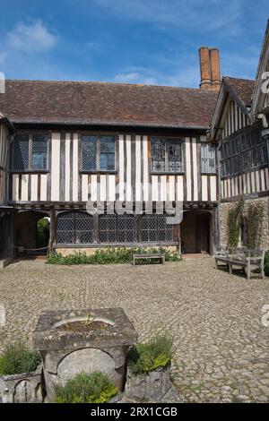 Chinese tourists visiting Penshurst Place Manor House in Penshurst, Kent in August. Stock Photo