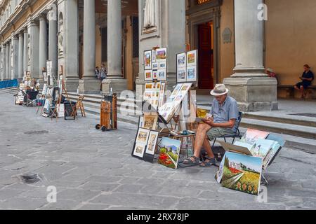 Florenz, Italien - 15. Juli 2023: Künstler in der Nähe der Uffizien malen Porträts und Landschaften Stockfoto