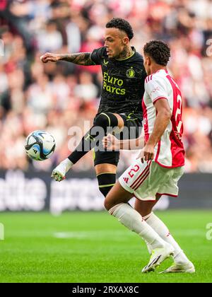 Amsterdam, Niederlande. September 2023. Amsterdam - Quilindschy Hartman aus Feyenoord, Devyne Rensch aus Ajax während des Eredivisie-Spiels zwischen Ajax und Feyenoord in der Johan Cruijff Arena am 24. September 2023 in Amsterdam, Niederlande. Anrede: Box to Box Pictures/Alamy Live News Stockfoto