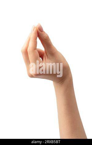 Die Hand einer Frau hält ein winziges oder dünnes Objekt, isoliert auf einem weißen Hintergrund. Stockfoto